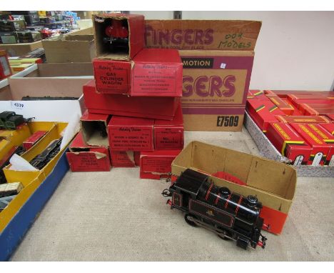 A Hornby 0 gauge clockwork tinplate 0-4-0 locomotive together with nine boxed items of rolling stock and two buffer stops and