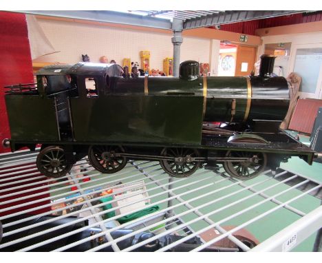 A live steam 3.5" gauge 0-6-2 tank locomotive "Mona" by L.B.S.C. in green livery, approximately 70cm long with manual and exp