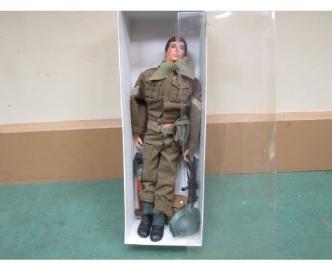 An Action Man British World War II Infantryman figure with brown flocked hair in jacket, trousers, boots, belt, helmet, repro