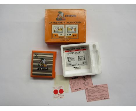 A boxed Ninendo Game &amp; Watch Lifeboat multi screen hand held computer game 