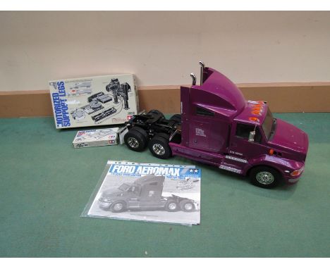 A Tamiya kit built 1:14 scale radio control Ford Aeromax tractor truck with boxed Motorized Support Legs and Semi-Trailer Lig