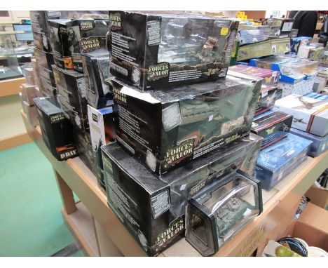 Sixteen boxed Unimax 'Forces of Valor' diecast military vehicles and one 'D Day Commemorative Series example, various scales 