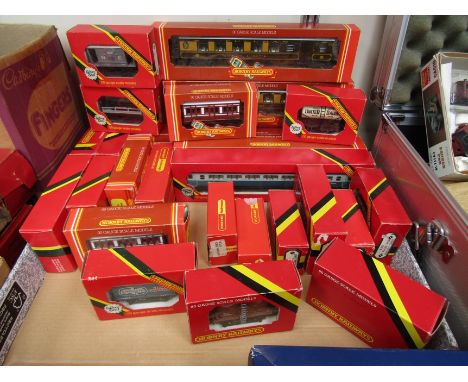Twenty seven boxed items of Hornby 00 rolling stock