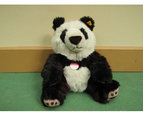 A Steiff 'Manschli' soft filled panda bear, 26cm tall