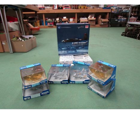 A Hobbymaster Air Power Series 1:72 scale HA3202 diecast A-26c Invader together with six perspex cased Armour Collection :100