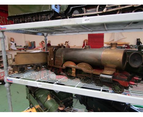 An unfinished live steam 3.5" gauge 4-4-2 locomotive and tender by L.B.S.C, locomotive approximately 69cm long, tender approx