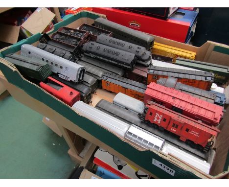A collection of assorted playworn 00/H0 gauge American locomotives and rolling stock including Tri-ang, Rivarossi, Bachmann e