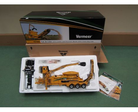 A boxed TWH 1:50 scale diecast Vermeer TG7000 Tub Grinder with Loader and Peterbilt Model 379 4-Axle Day Cab