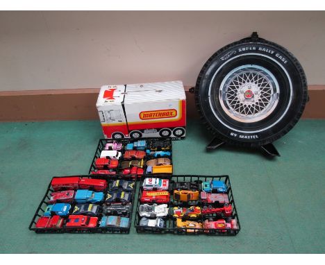 A Mattel Hot Wheels Super Rally Case and a Matchbox Carry Case both containing assorted play worn diecast vehicles 