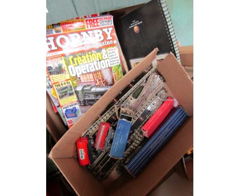 Three Hornby Dublo 00 gauge wagons, a quantity of track and a box of model railway magazines 