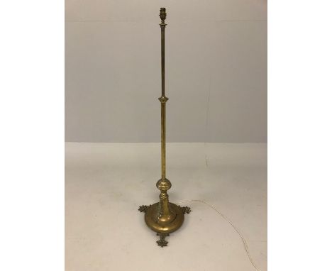 Vintage lighting, Victorian style brass standard lamp base with lion paw feet approximately 136cm tall