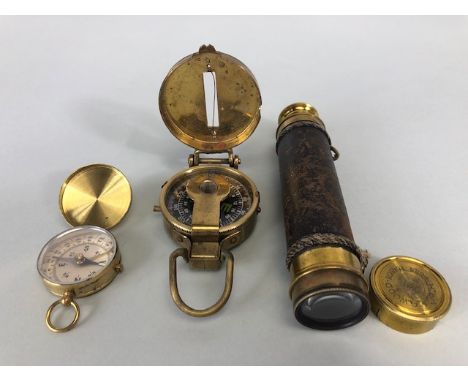 Military interest, early 20th century pocket telescope end cap marked EG Wood Cheapside, London and two brass cased pocket co