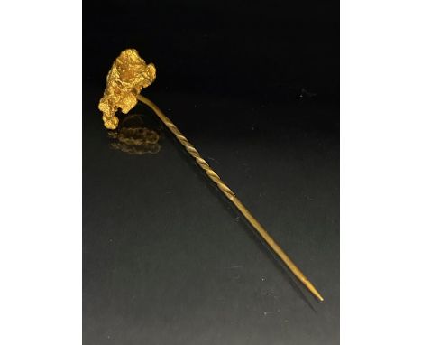 Antique Jewellery, stick pin of unmarked yellow metal set with an untested gold nugget, an accompanying hand written card say