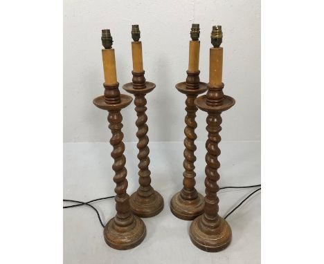 Mid 20th century continental barley twist lamp bases in light oak designed to look like church Altar candle holders x4