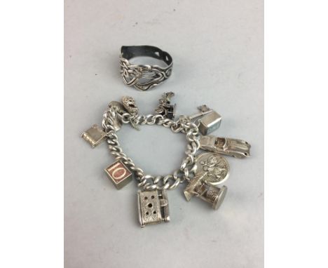 SILVER CHARM BRACELET, and a silver napkin ring of Celtic design, approx. 108 grams gross
