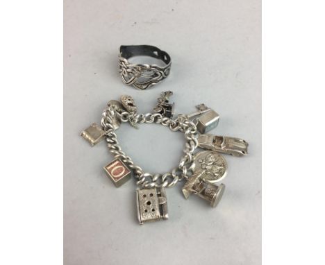 SILVER CHARM BRACELET, and a silver napkin ring of Celtic design, approx. 108 grams gross