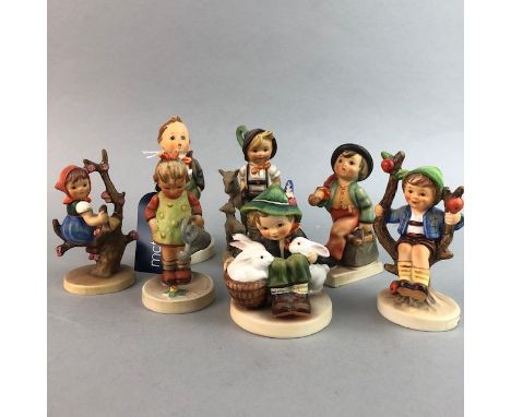 SEVEN HUMMEL FIGURES OF CHILDREN, including a choir boy, the tallest 7cm high
