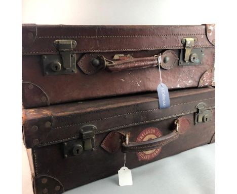 TWO VINTAGE LEATHER SUITCASES, the largest 61cm wide