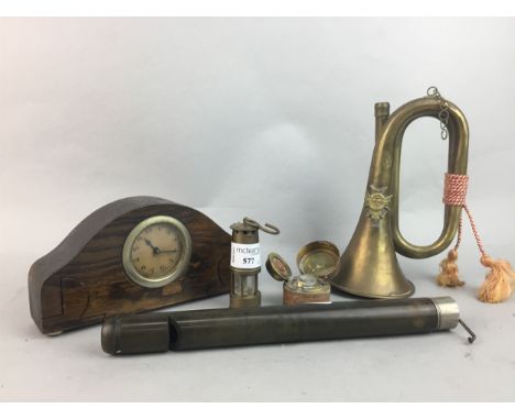 BRASS MINIATURE MINER'S LAMP, along with a Victorian pocket inkwell, an oak cased clock, brass bugle and a Lotus flute