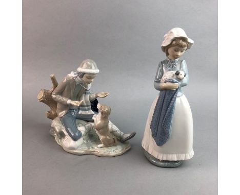 NAO FIGURE OF HABLANDO CON EL PERRO, 19.5cm high, along with another Nao figure of a girl with a puppy (2)