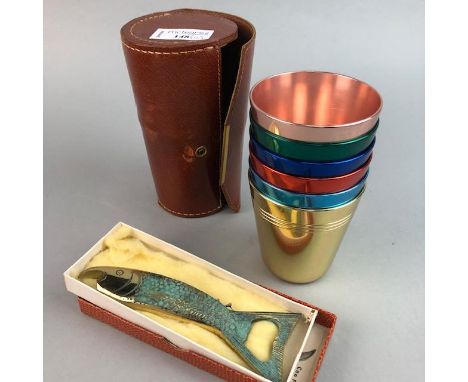 SET OF SIX METAL TRAVELLING DRINKING CUPS, by Hickok, Australia also a 'fish' corkscrew, a 'claymore' letter opener and a car