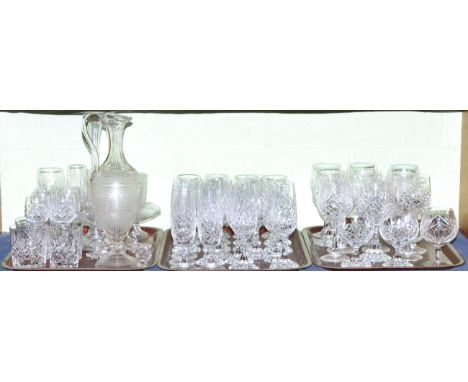Three trays of crystal drinking glasses and an engraved claret jug with two matching glasses CONDITION REPORT: Sold as seen u