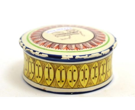 A Pearlware circular box, enamel painted with screw fitting lid CONDITION REPORT: Loss to enamel decoration, hairline crack t