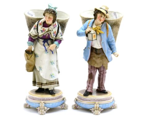 Pair of late 19th century Continental figures modelled as a male and female with basket, height 31cm CONDITION REPORT: Pipe d