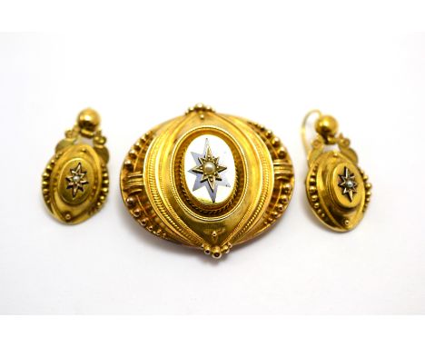 # A Victorian brooch and earring suite with blue enamel star detail and seed pearls inset, brooch with locket back measures 4