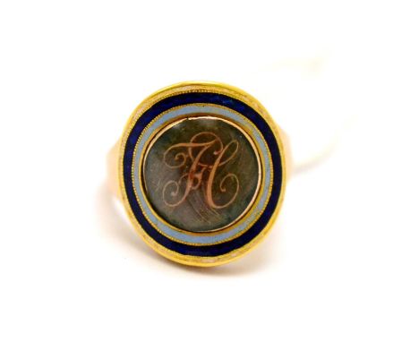 # A Georgian mourning ring, with plaited hair and grey, blue and white enamel, initials 'FC' over plaited hair to the centre 