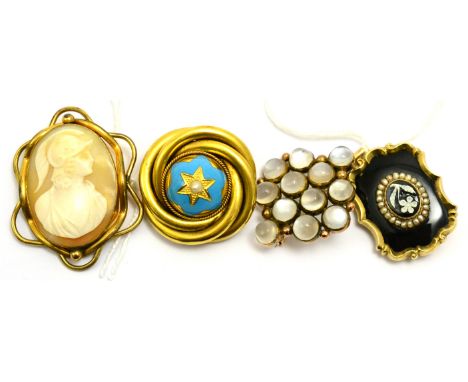 # Four brooches, including; a cameo brooch depicting a warrior with winged helmet, a Victorian brooch set with a split pearl,