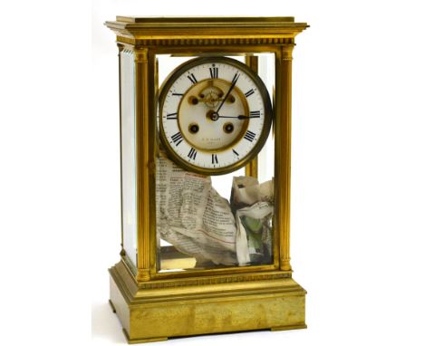 A brass four glass mantel clock, retailed by J D Harris, Paris, circa 1890, fluted columns and bevelled glass panels, 4-1/4-i