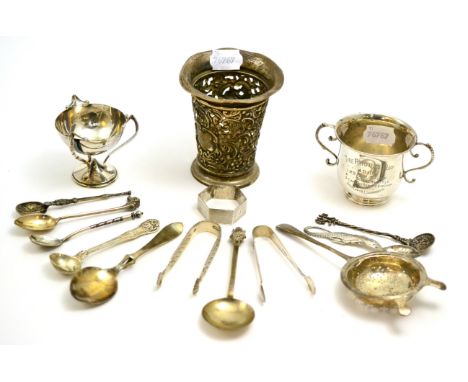 Silver spoons, a twin-handled cup, tongs, vase etc  CONDITION REPORT: Sold as seen unless a specific item is requested.