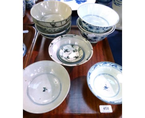 Ten various Chinese provincial porcelain bowls, 18th/19th century, with underglaze blue decoration, together with two similar