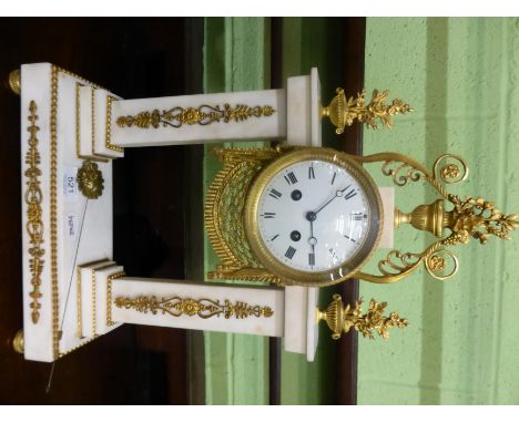 A white marble portico striking mantel clock, 19th century, floral and scroll gilt metal mounts, 4-inch enamel dial with Roma