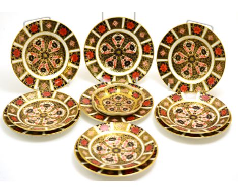 A group of seven Royal Crown Derby Imari side plates, No.1128 together with three matching saucers and a trinket dish  CONDIT