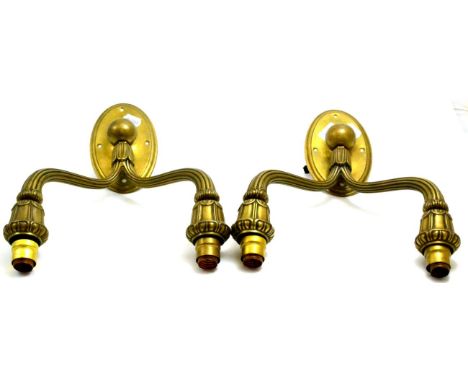 A pair of Art Deco brass double wall lights/sconces, on oval backs, unmarked, 40cm CONDITION REPORT: 