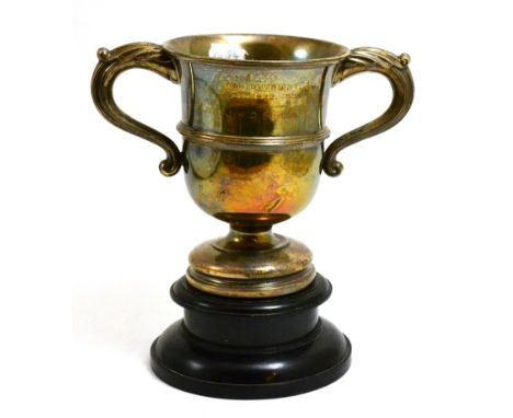 A silver trophy cup presented by J A Player, 1920 CONDITION REPORT: Tarnished, light gauge, engraved, wonky