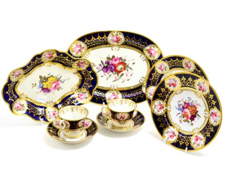 A Chamberlain Worcester shaped oval dessert dish with a floral painted centre and blue and gilt border, pattern 822 29cm; and