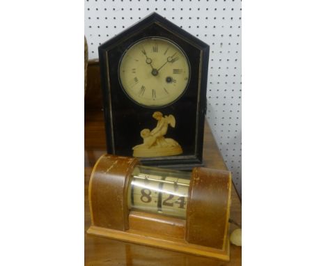 Victorian mantel clock in black ebonised case together with an electric desk calendar (2).
