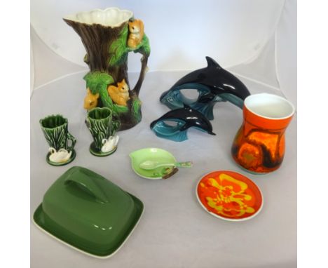 A collection of various chinaware including Poole pottery, Sylvac ware and Carlton ware.