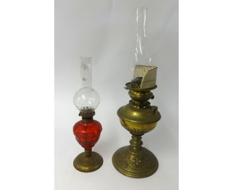 A pair of four drawer metal card cabinets, two oil lamps, another small oil lamp and a four piece silver plated tea service.