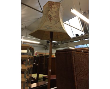 A TEAK STANDARD LAMP