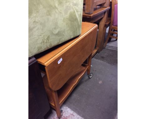 A LIGHT WOOD TROLLEY