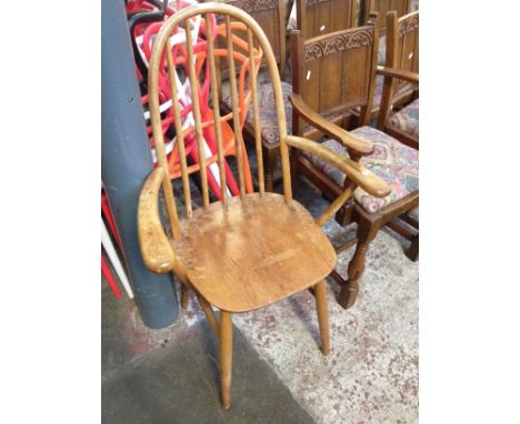 AN ERCOL STYLE ARMCHAIR, W62CM
