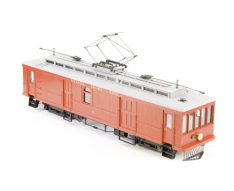 Gauge 1 2-rail American short-line electric freight car: possibly kitbuilt, a double-truck trolley car finished in ‘Nevada Sh