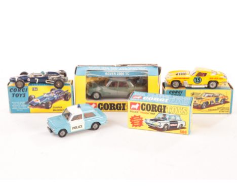 A Corgi Toys 506 Police Panda Imp, light blue body, white roof, 156 Cooper Maserati F1, 337 Customized Corvette Sting Ray, 27