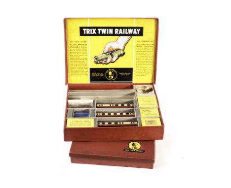 Trix Twin Railway sets: No. 1/334 Passenger Train, including green BR 0-4-0 and tender, April 1956, and No. 1/334 Passenger T