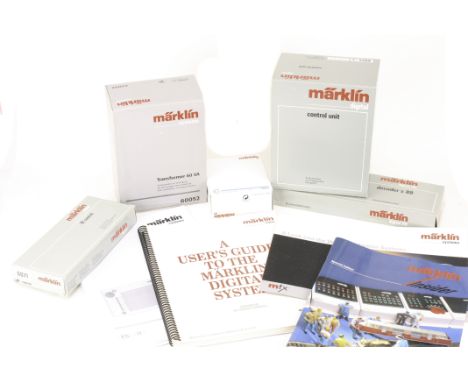 Märklin H0 Gauge Digital Control Equipment and guidebooks: comprising ‘Central Station’ console, transformers, central contro