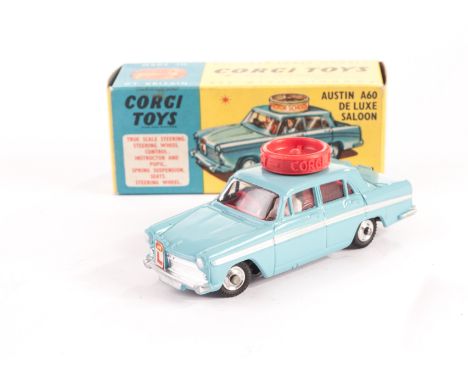 A Corgi Toys 236 Austin A60 Motor School Car, light blue body, red interior, spun hubs, Highway Code leaflet, in original box